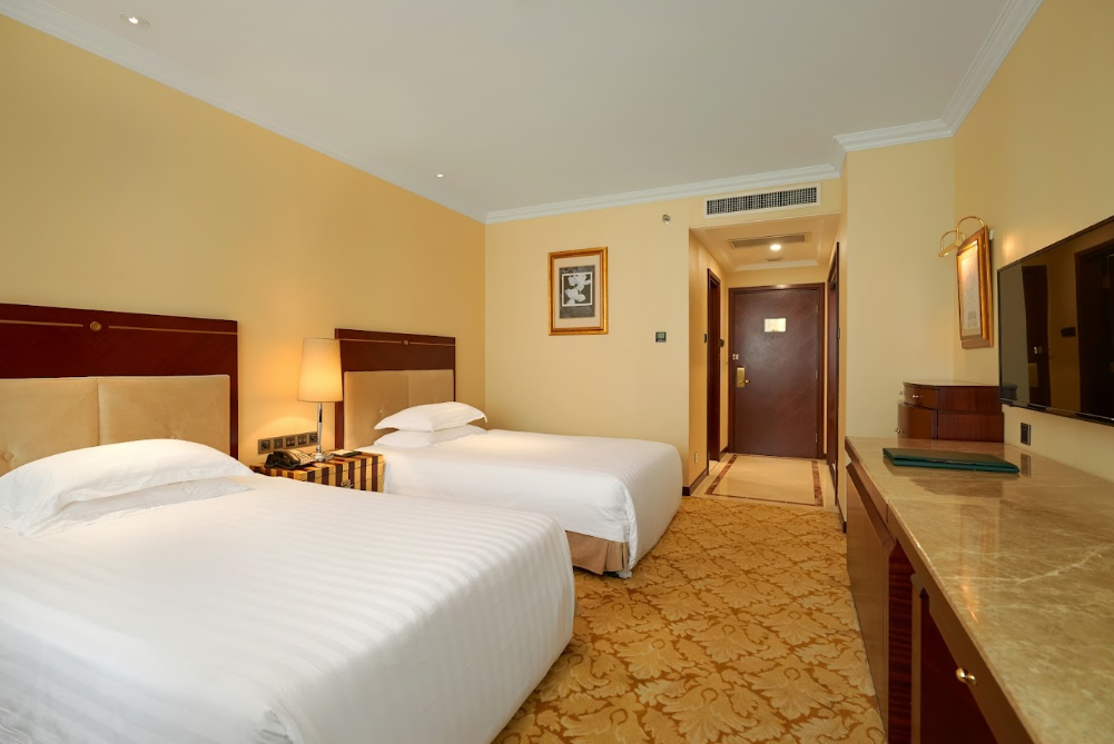 Phòng Tiểu Chuẩn Đôi được trang bị hai giường ngủ riêng biệt, đáp ứng nhu cầu lưu trú của nhóm bạn, đồng nghiệp hoặc gia đình.