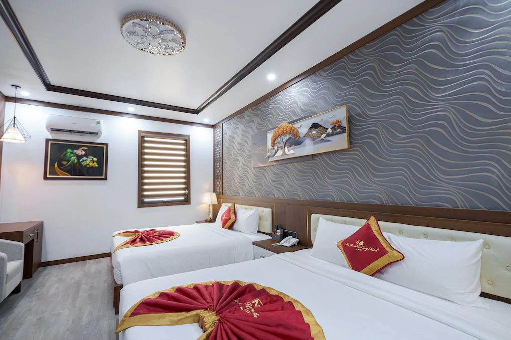 Phòng Family Quad được trang bị các giường lớn êm ái mà vẫn đảm bảo không gian sinh hoạt chung thoải mái.